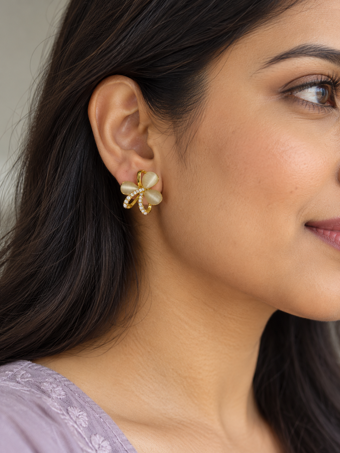 Ivory Petal Crystal Stud Earrings — worn by model