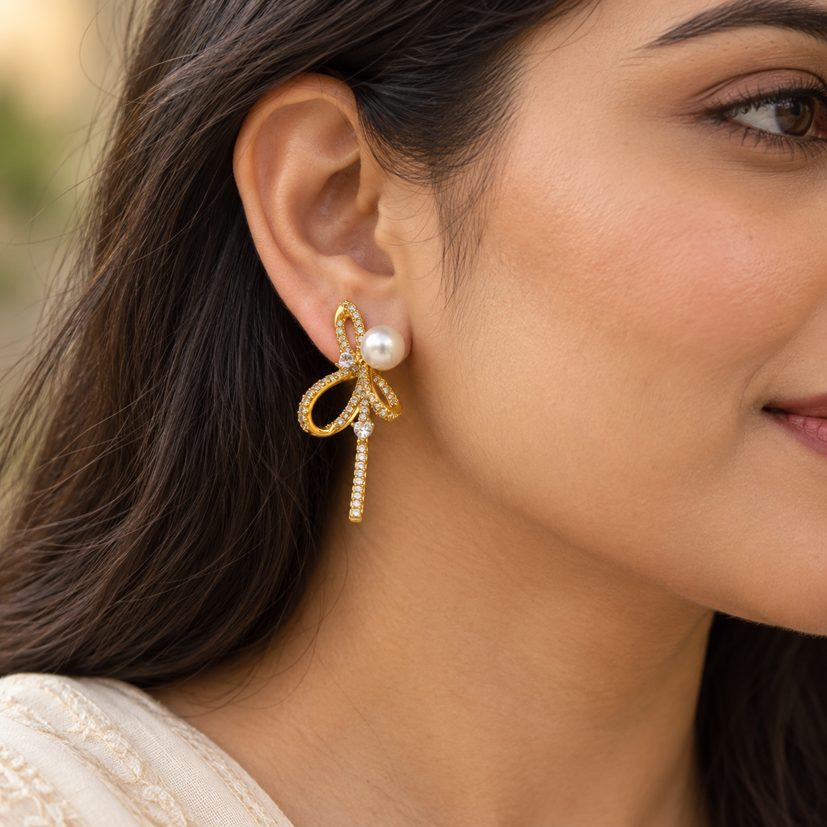 Pearl Accent Crystal Ribbon Earrings — worn by model