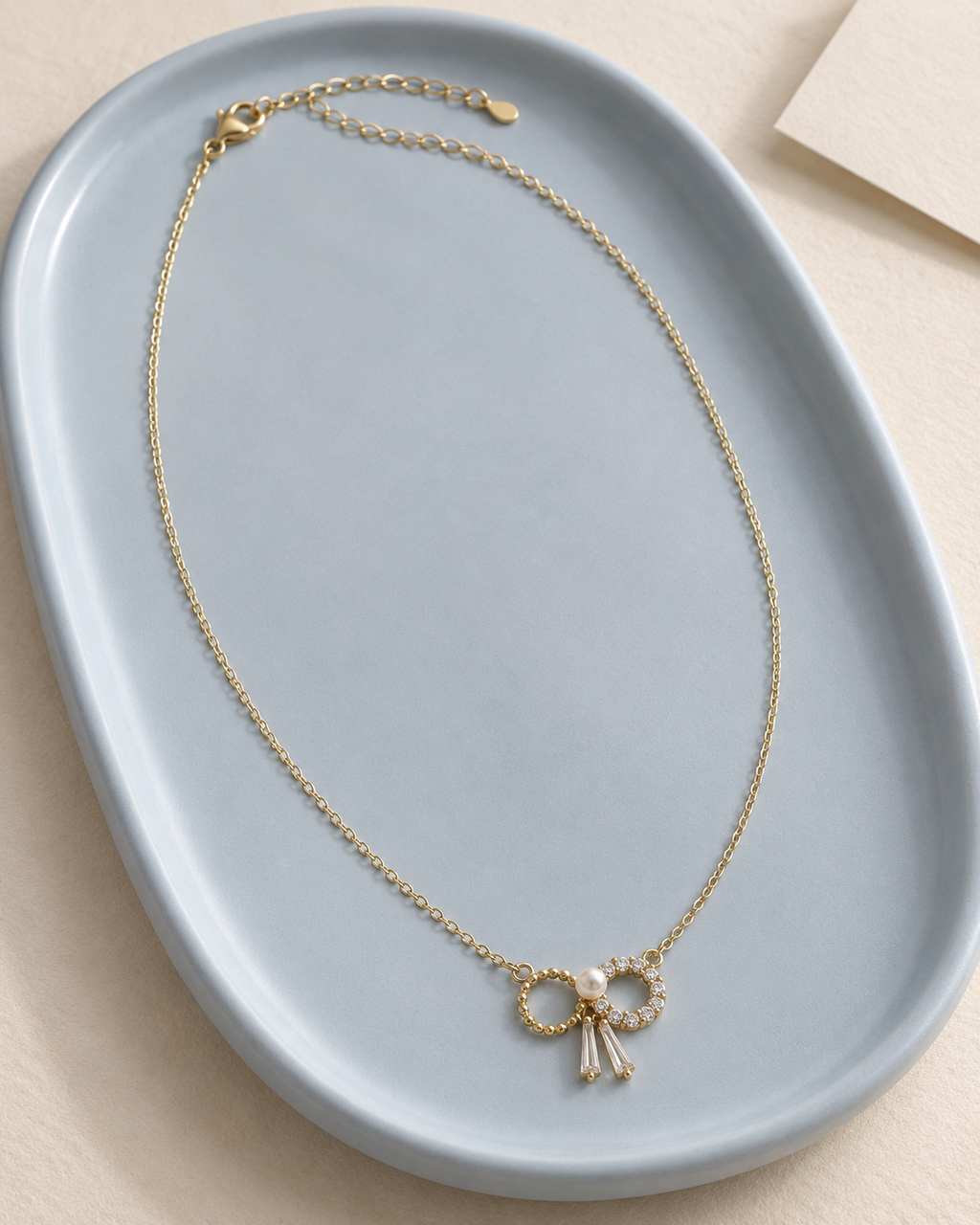 Pearl Accent Crystal Bow Necklace — aesthetic setting