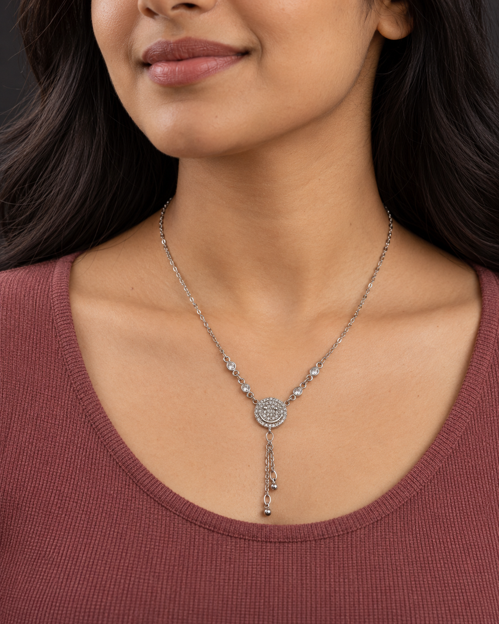 Silver-Tone Crystal Smiley Tassel Necklace — worn by model