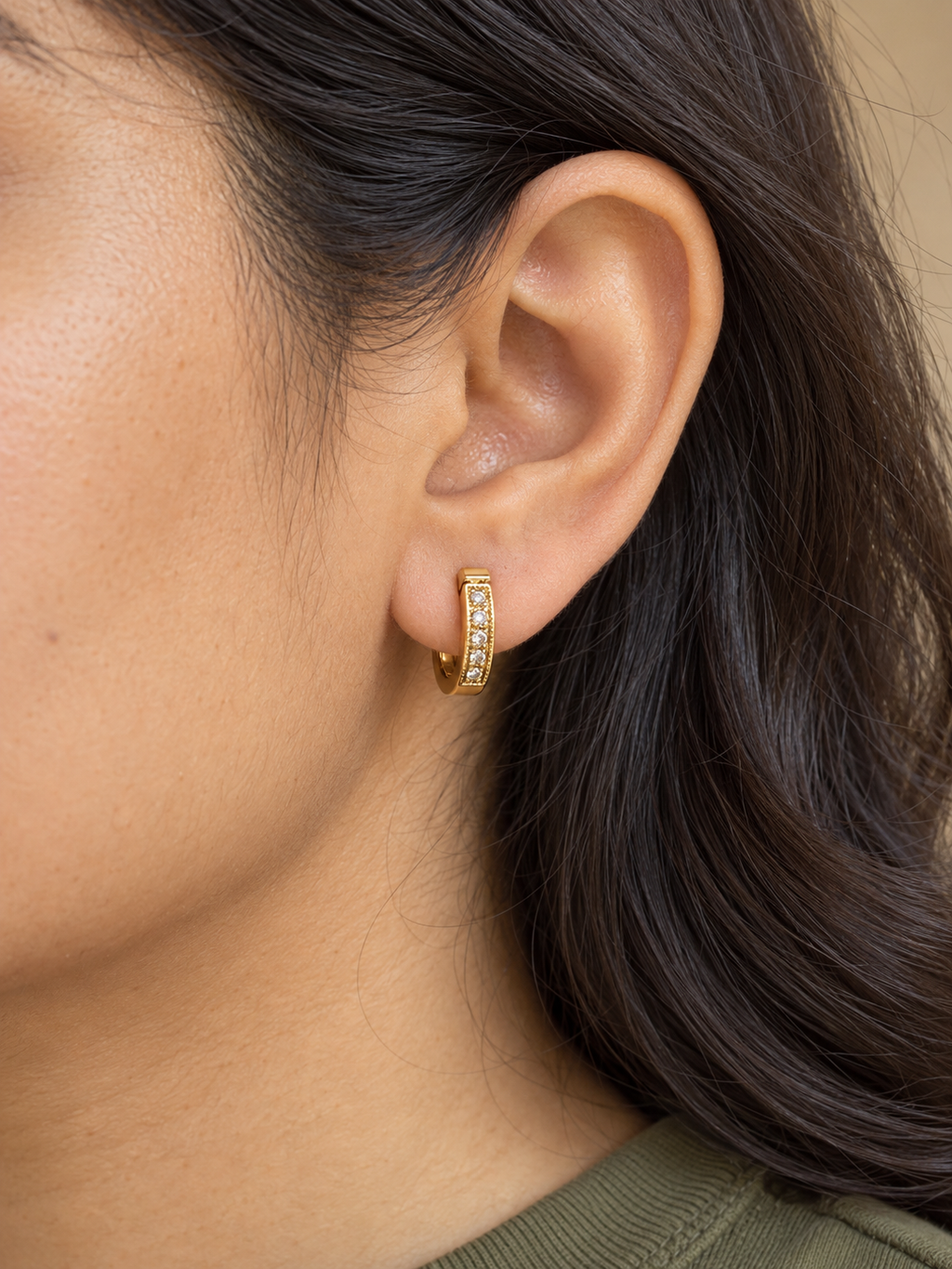 Crystal Inset Gold-Tone Huggie Hoops — worn by model