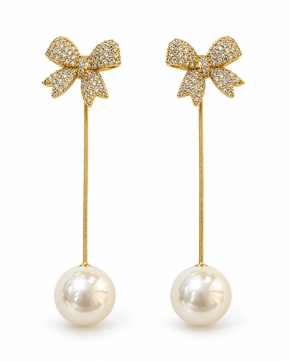 Ivory Pearl Bow Long Drop Earrings — white background